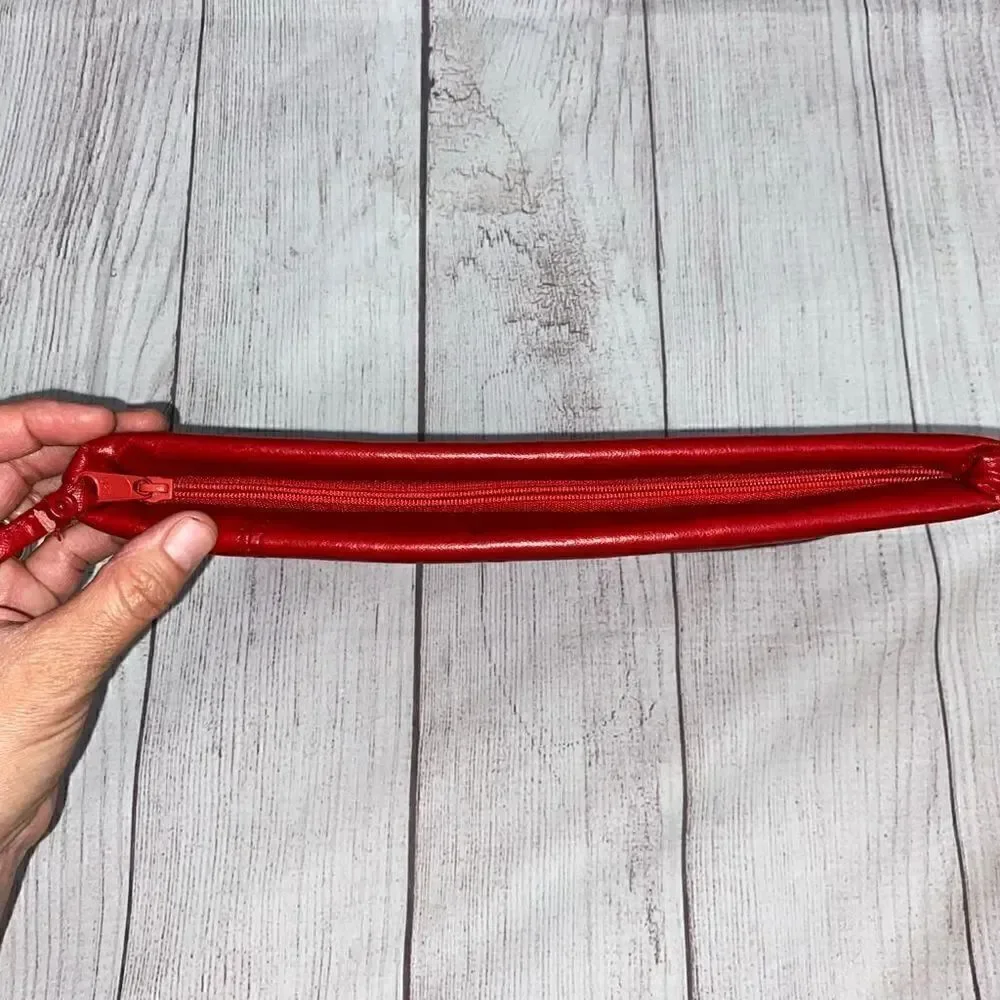 Clutch purse with wrist strap, zipper closure red